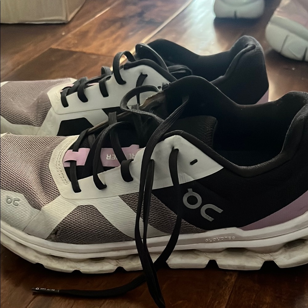 On Running Black and White Athletic Shoes with Sporty Design